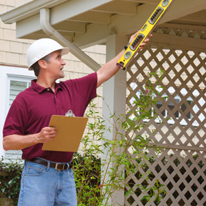 Home Inspector performing an inspection